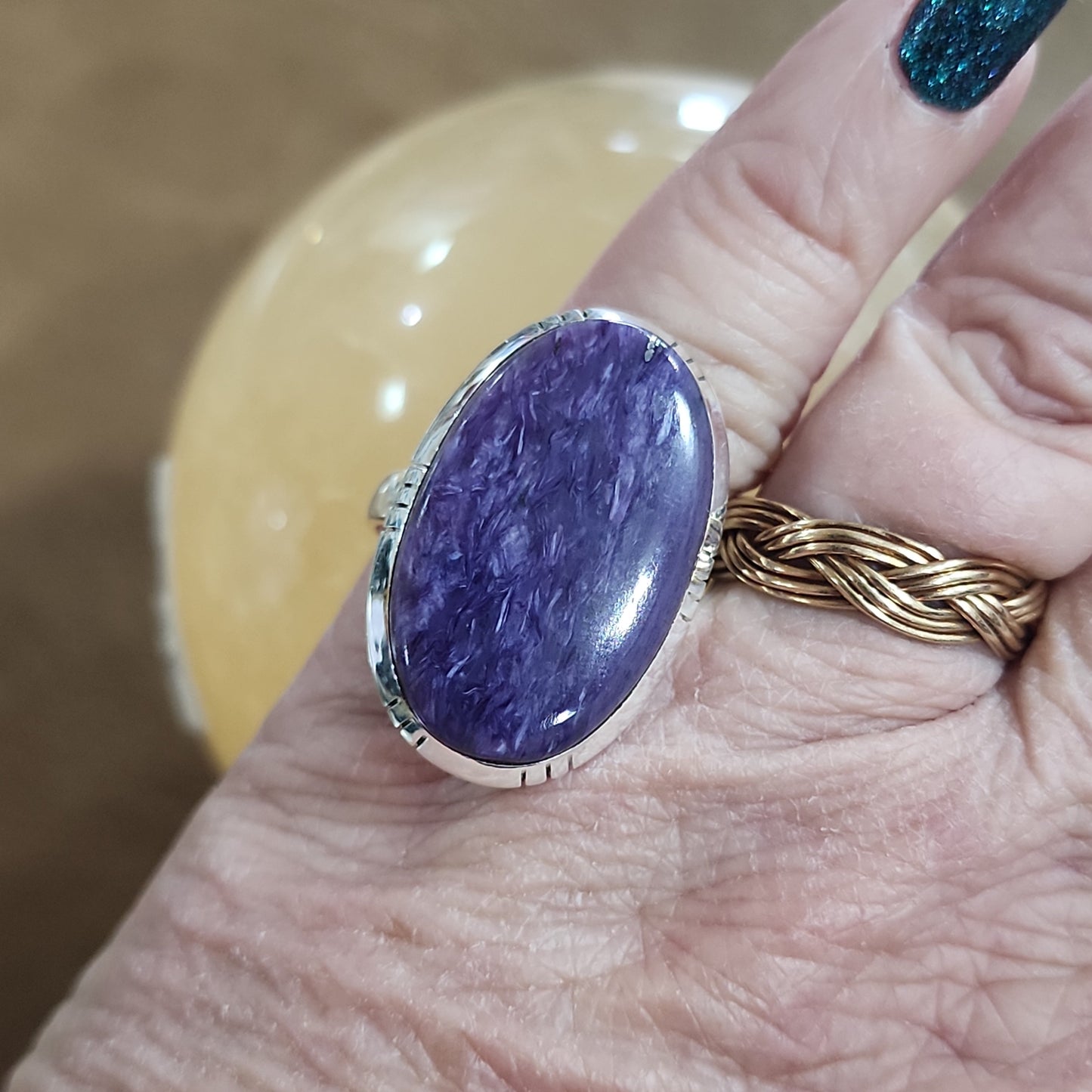 Assorted sterling silver rings featuring unique genuine gemstones in various shapes and colors, displayed on a white background. Perfect for crystal energy, personal style, and one-of-a-kind magic.

