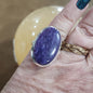Assorted sterling silver rings featuring unique genuine gemstones in various shapes and colors, displayed on a white background. Perfect for crystal energy, personal style, and one-of-a-kind magic.

