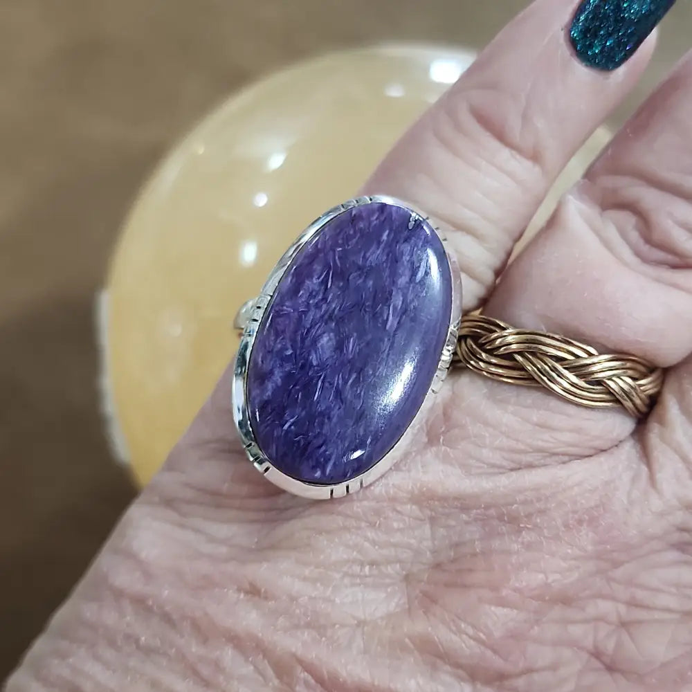 Assorted sterling silver rings featuring unique genuine gemstones in various shapes and colors, displayed on a white background. Perfect for crystal energy, personal style, and one-of-a-kind magic.


