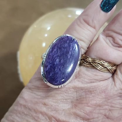 Assorted sterling silver rings featuring unique genuine gemstones in various shapes and colors, displayed on a white background. Perfect for crystal energy, personal style, and one-of-a-kind magic.

