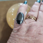 Assorted sterling silver rings featuring unique genuine gemstones in various shapes and colors, displayed on a white background. Perfect for crystal energy, personal style, and one-of-a-kind magic.

