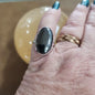 Assorted sterling silver rings featuring unique genuine gemstones in various shapes and colors, displayed on a white background. Perfect for crystal energy, personal style, and one-of-a-kind magic.

