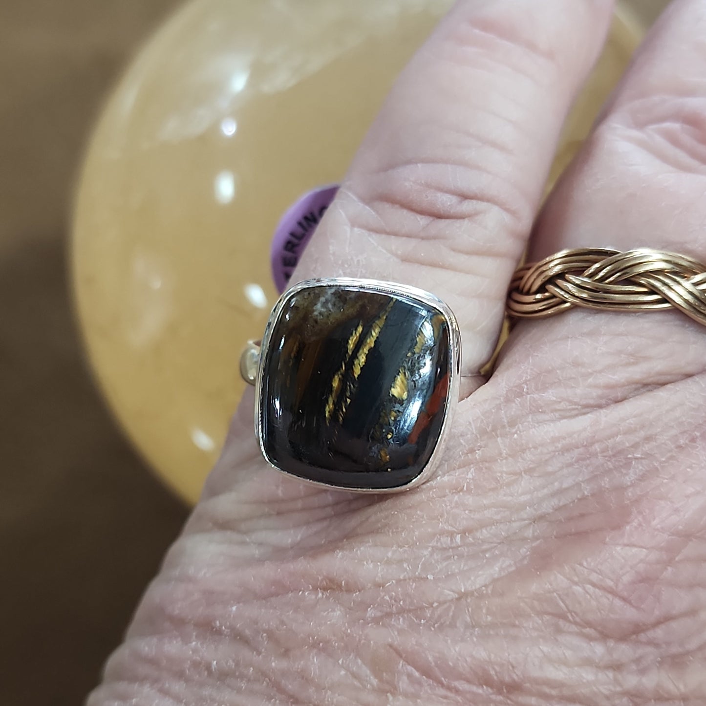 Assorted sterling silver rings featuring unique genuine gemstones in various shapes and colors, displayed on a white background. Perfect for crystal energy, personal style, and one-of-a-kind magic.

