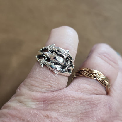 Assorted sterling silver rings featuring unique genuine gemstones in various shapes and colors, displayed on a white background. Perfect for crystal energy, personal style, and one-of-a-kind magic.
